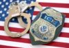 Man Said ICE Stole His Wife. Police Say He Murdered Her ICE officer badge and handcuffs on an American flag