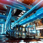 Industrial plant with large metal pipes and gauges
