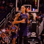 Brittney Griner running on a basketball court during a game